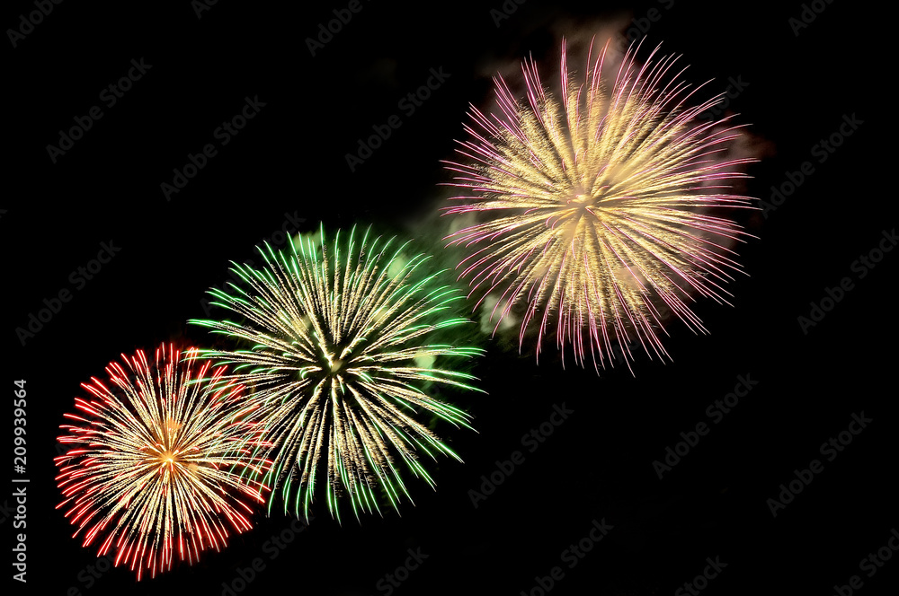 Flashes of fireworks of green, red, purple and gold color Flashes of fireworks of green, red, purple and gold color