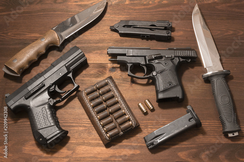 composition of pistols and army knives