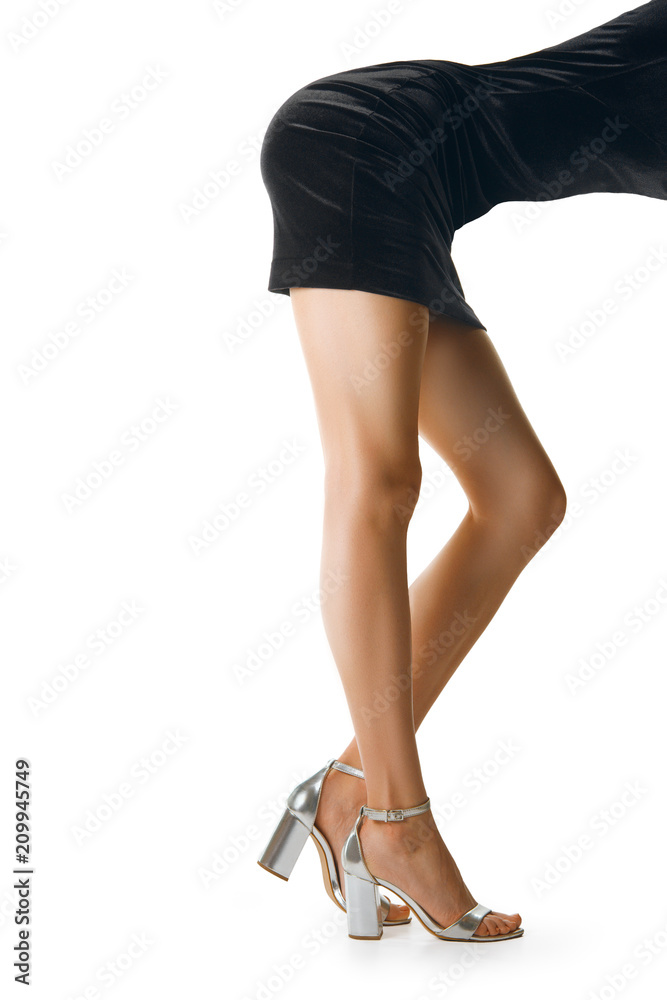 Female body bend forward. Long slim female legs in profile. Female body bend forward. Long slim female legs in profile.