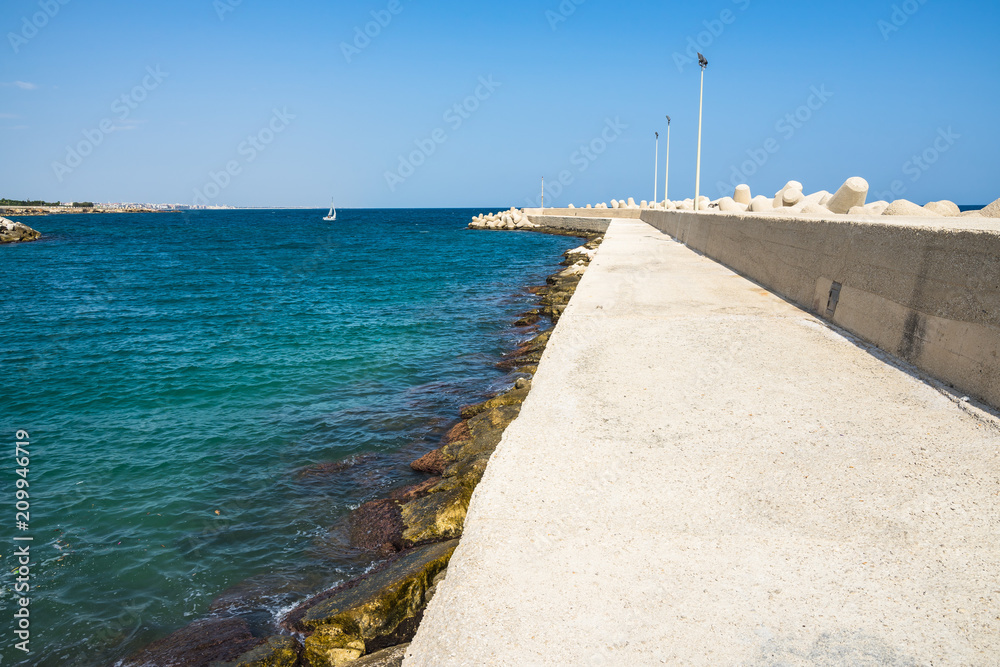 Giovinazzo pier in sunny day, Apulia, Italy