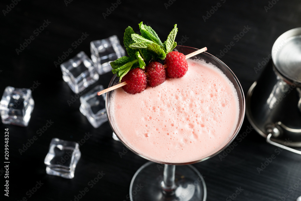 raspberry cosmopolitan martini vodka cocktail drink bar mint garnish ice bartender