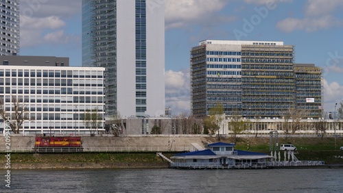 Photography Red train, ship and buildings in Bratislava port, Slovakia