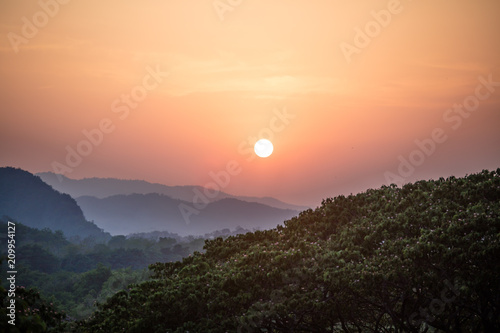 Sunset on tropical rainforest in northern Thailand