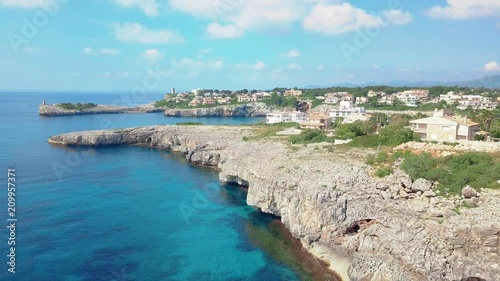 Aerial landscape of the beautiful bay of Cala Mandia with a wonderful turquoise sea, Porto Cristo, Majorca, Spain photo