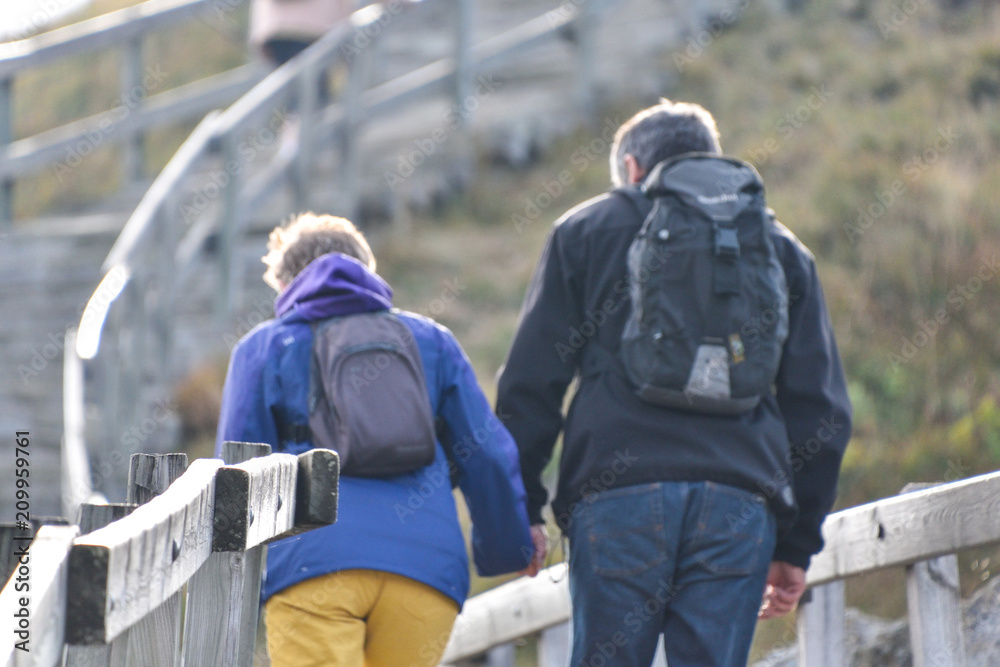 Puy de Sancy , France -September 23, 2016: couple hiking at Puy de Sancy  in Auvergne, France