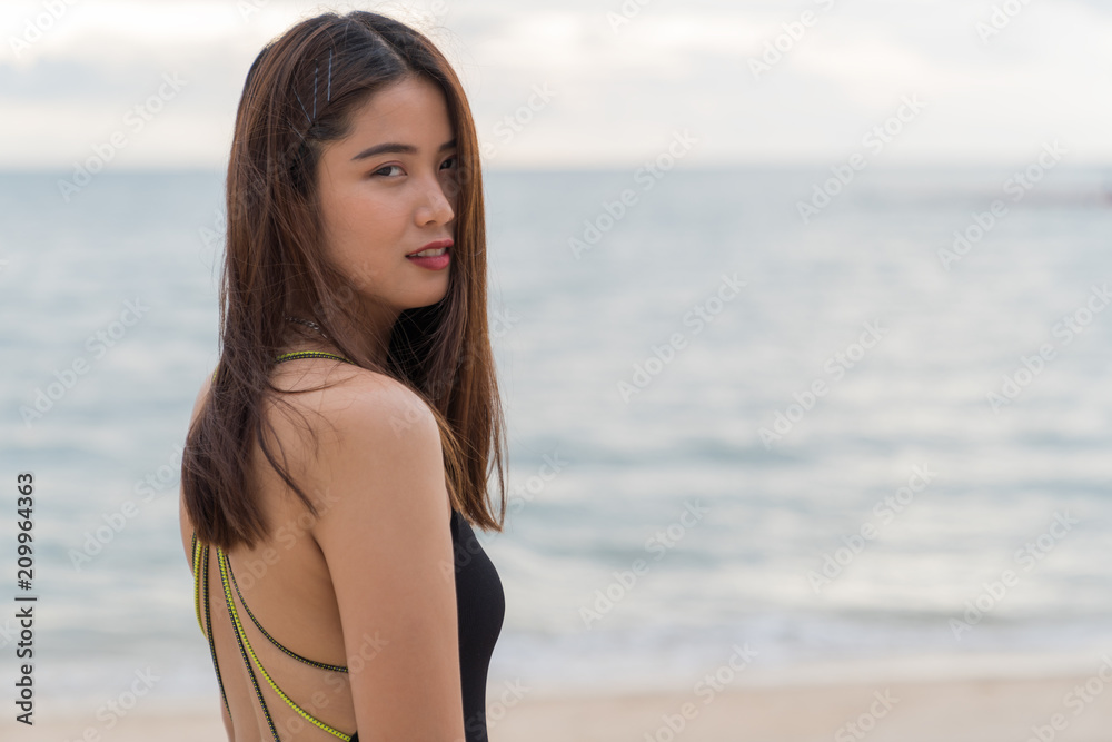 Asian beautiful woman enjoyful on the beach background. Asian beautiful woman enjoyful on the beach background.