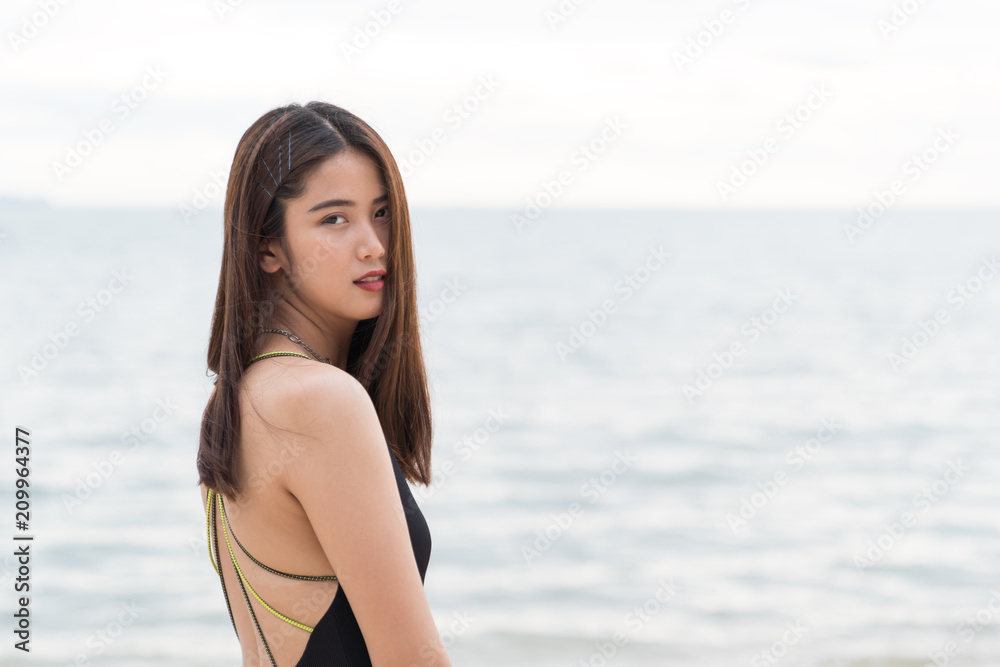 Asian beautiful woman enjoyful on the beach background. Asian beautiful woman enjoyful on the beach background.