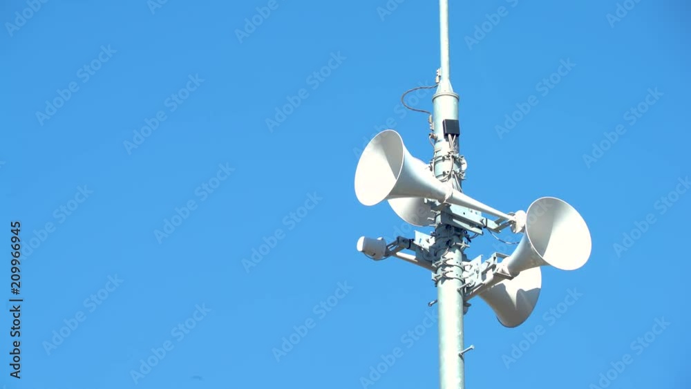 Outdoor community loudspeaker system on a clear sky day Outdoor community loudspeaker system on a clear sky day
