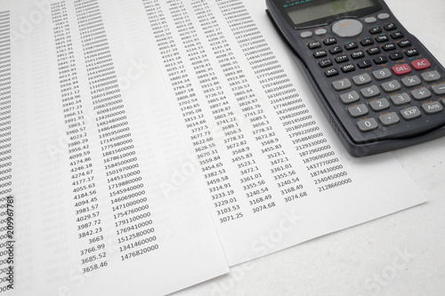 printout paper with calc on desk photo