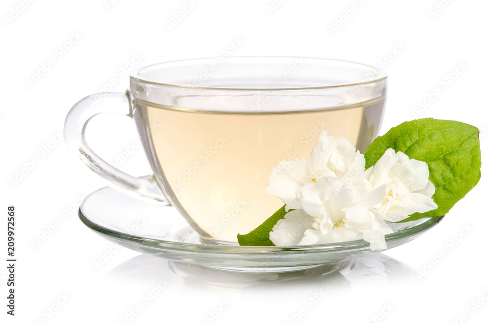 Glass cup of Tea with jasmine flowers isolated on white background Glass cup of Tea with jasmine flowers isolated on white background
