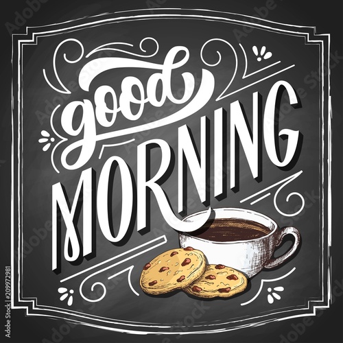 Good morning hand drawn lettering on black chalkboard background, with sketch cup of coffee and cookies illustration. Vintage vector design.