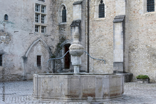 Fountain in old mediaval castle of Bargeme in Provence France photo