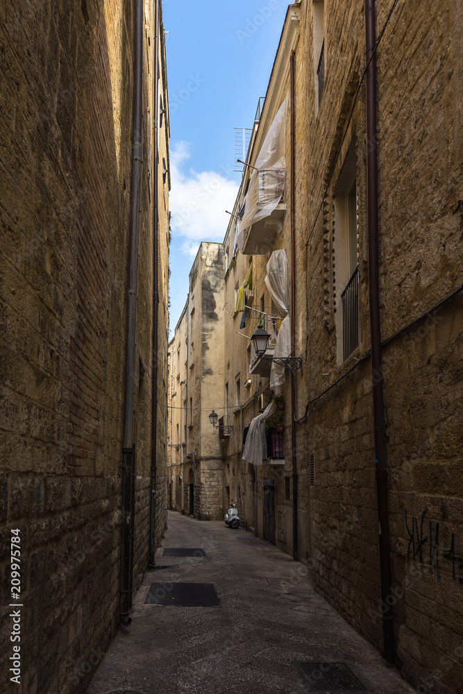 A narrow street in Bari historic centre, called in Italian 
