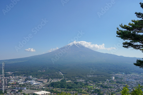 Mountain Fuji on clear blue sky and small town around mountain Fuji 