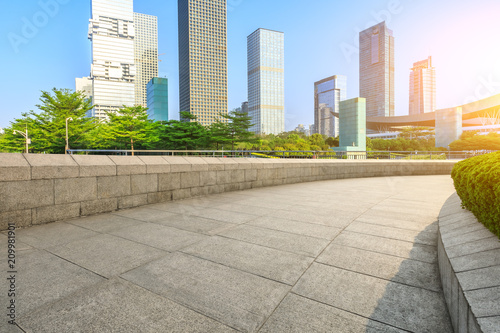 Empty passage and modern commercial building at sunrise in Shenzhen