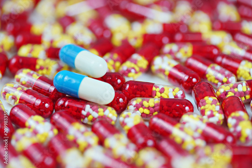 colorful medical drug capsule on white background
