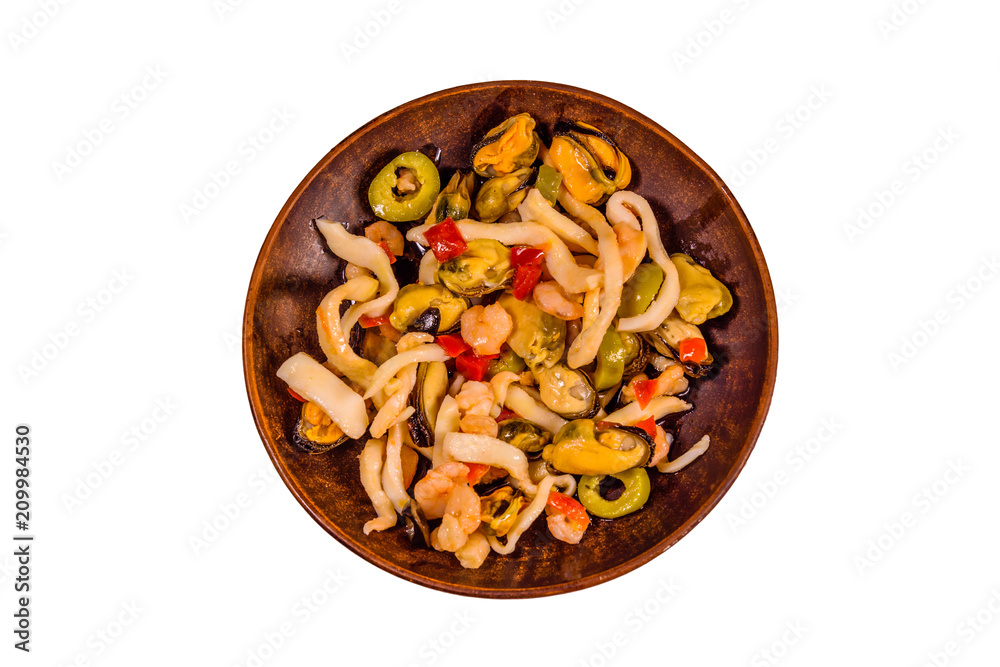 Ceramic plate with the different sea food and olives isolated on white background Ceramic plate with the different sea food and olives isolated on white background