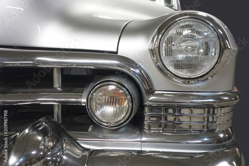 Detail front headlight of an old vintage car © Chepko Danil