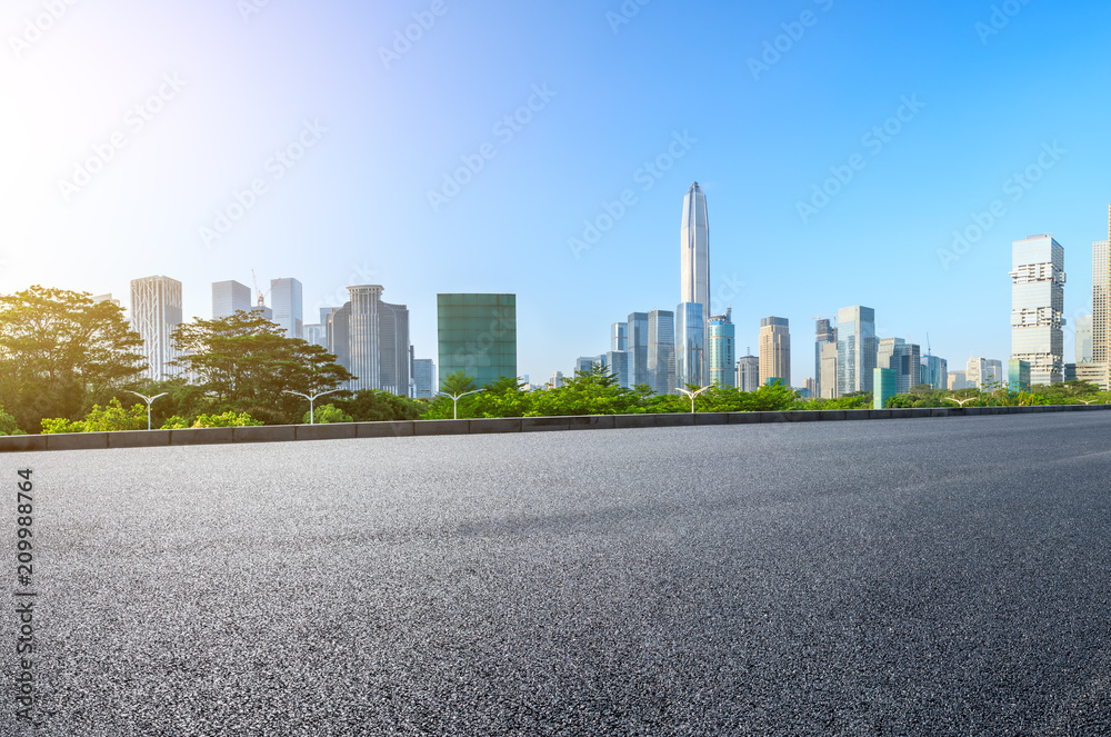 Empty asphalt road and modern city skyline panorama in Shenzhen,China