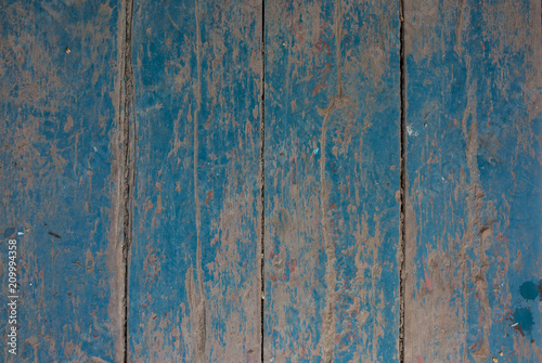 Old vintage blue and beige painted wooden planks. Rustic background texture.