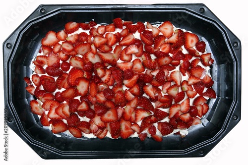 Strawberries in plastic dish.
