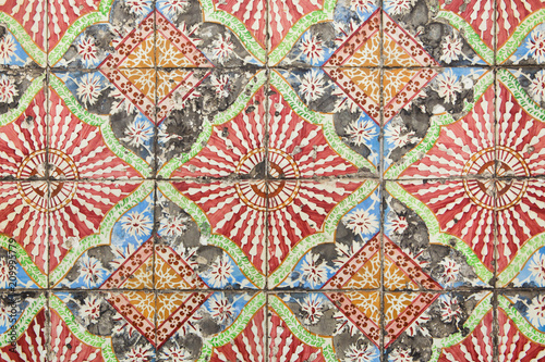 Traditional Portuguese azulejo tiles on the building in Porto, Portugal.