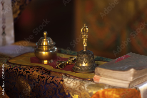 Ritual hand bell and dorje in the Buddhist temple as the enlightenment symbol.