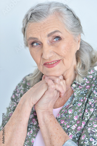 close up portrait of happy senior woman  at home
