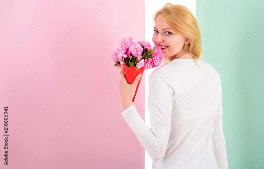 Her favorite flowers. Girl holding bouquet flowers enjoy favorite fragrance. Lady happy received favorite flowers as gift. Woman smiling likes to receive bouquet surprise. Bouquet equal happiness Her favorite flowers. Girl holding bouquet flowers enjoy favorite fragrance. Lady happy received favorite flowers as gift. Woman smiling likes to receive bouquet surprise. Bouquet equal happiness