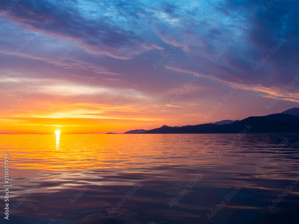 Beautiful sunset in Adriatic sea, Montenegro, captured from a sailing boat