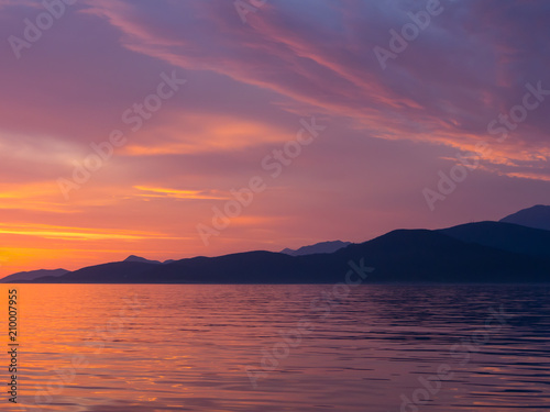 Beautiful sunset in Adriatic sea, Montenegro, captured from a sailing boat © Kot
