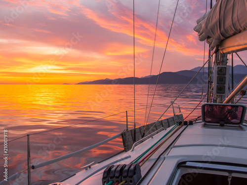 Fototapeta Naklejka Na Ścianę i Meble -  Beautiful sunset in Adriatic sea, Montenegro, captured from a sailing boat