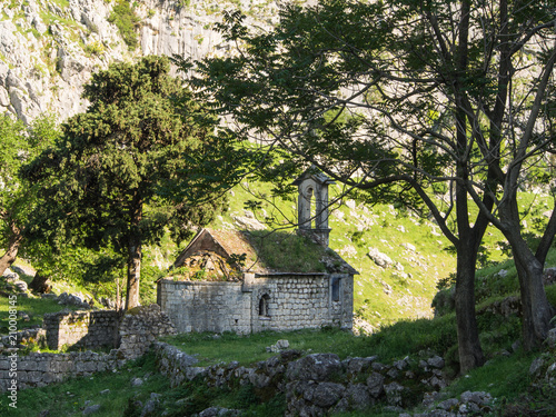 Abandoned ancient chapel in the mountains, behind Kotor fortress. Montenegro, Kotor