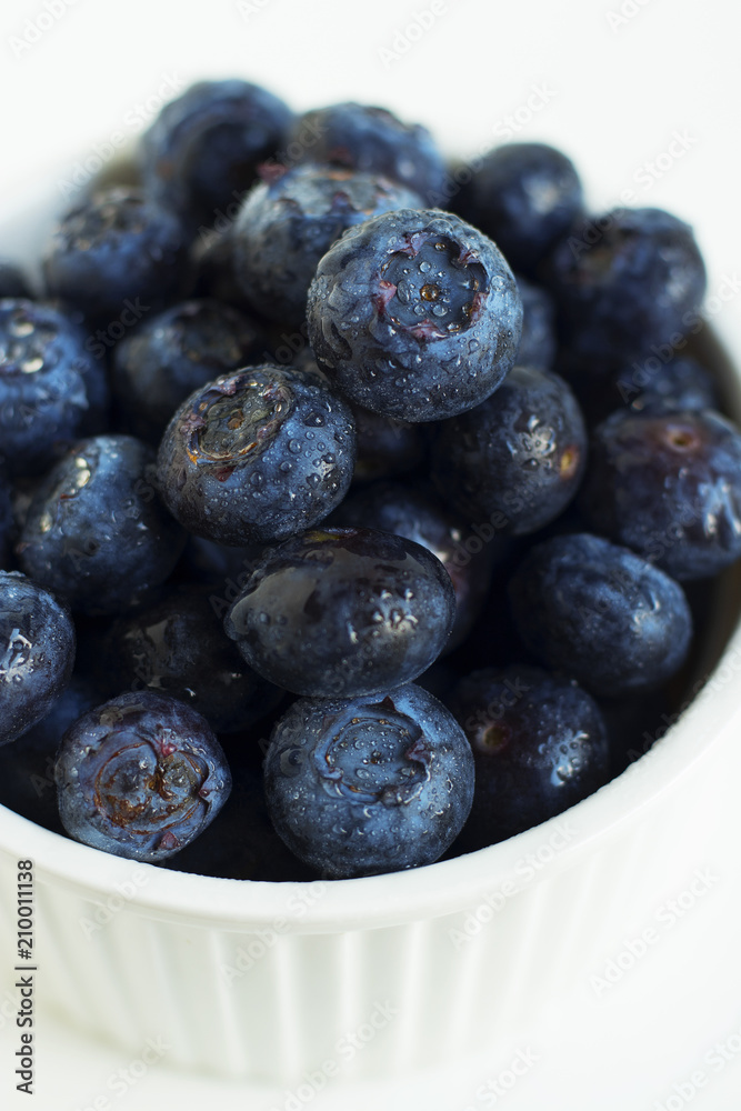handful of fresh American blueberries handful of fresh American blueberries