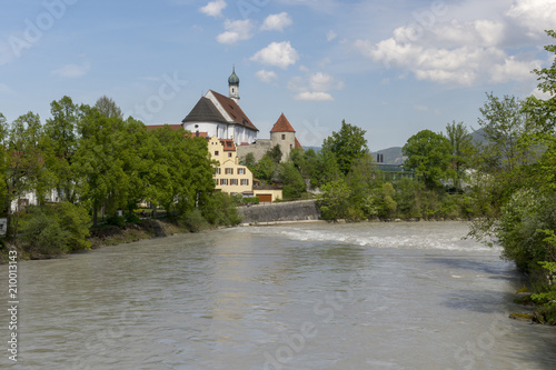 The river Lech in Germay in spring time with Franziskanerkloster in the City Fussen.