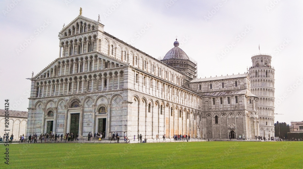 Big square with cathedral and leaning tower in Tuscany