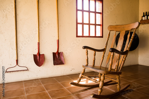 Wooden rocking chair in a farmer house