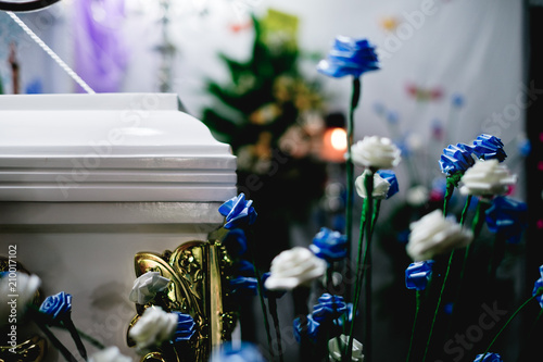 Handcrafted white and blue flowers. Selective focus. Copy space.