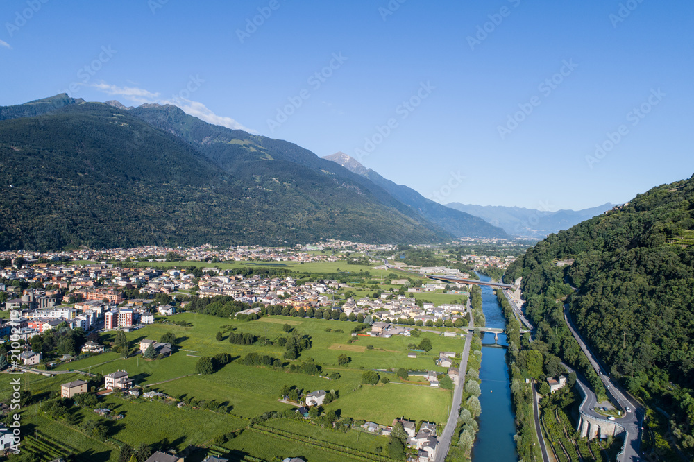 Adda river and city of Morbegno. Valtellina. Aerial shot
