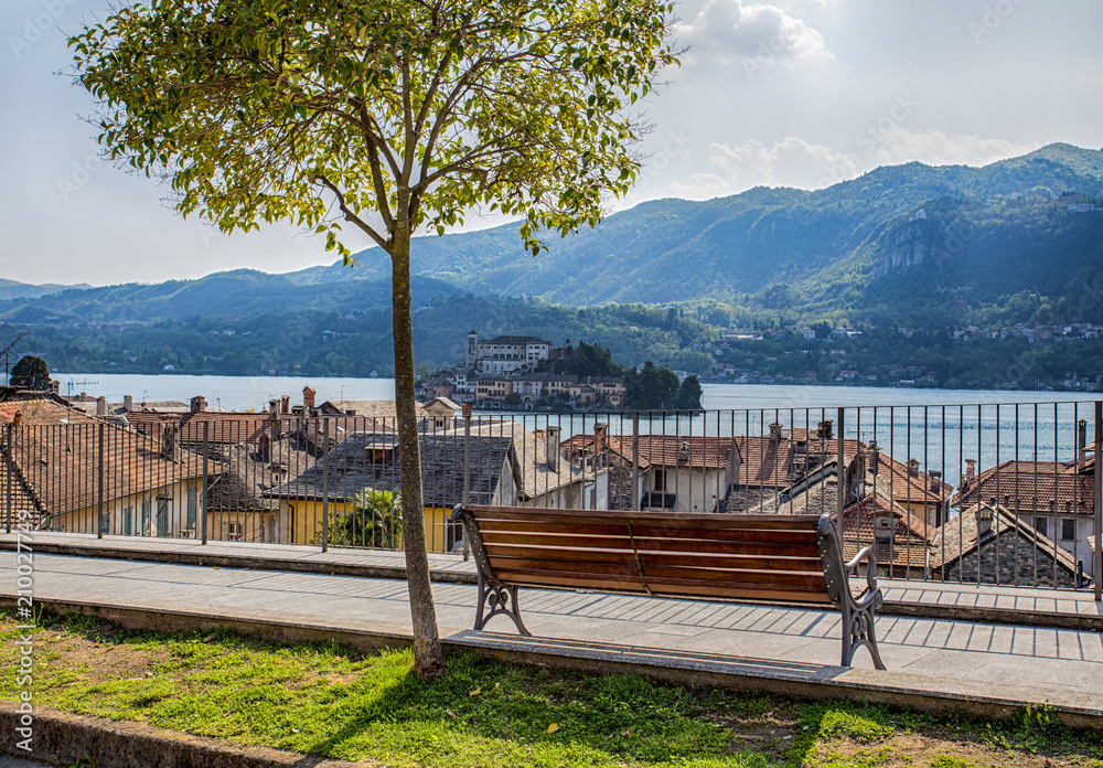 Fototapeta premium Orta San Giulio and San Giulio island, Novara province, Italy. it is part of the circuit of the most beautiful villages in Italy and is awarded the orange flag by the Italian Touring Club.