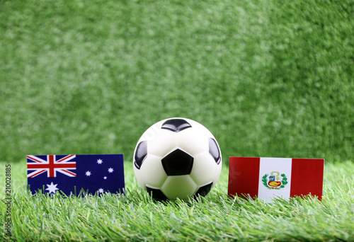 ball with Australia VS Peru flag match on Green grass football 2018