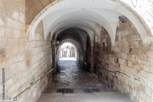 Silent  streets in the old city of Jerusalem, Israel. The St. Francis Street - Via Delorosa. photo