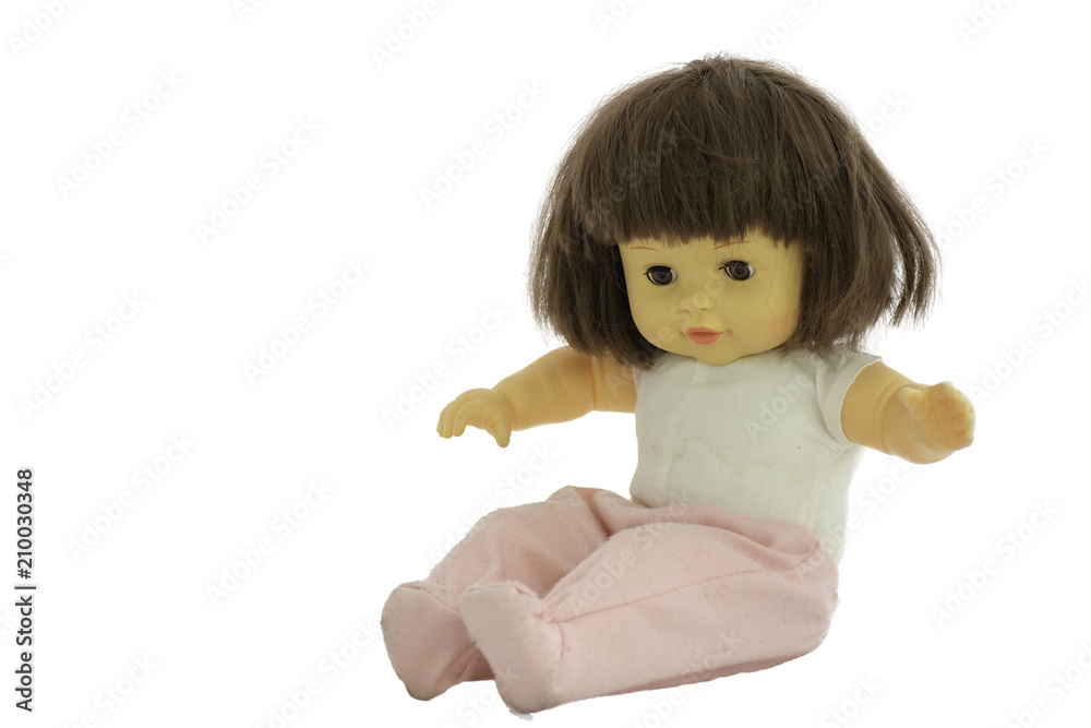 Girl doll sititng, isolated on white background Girl doll sititng, isolated on white background