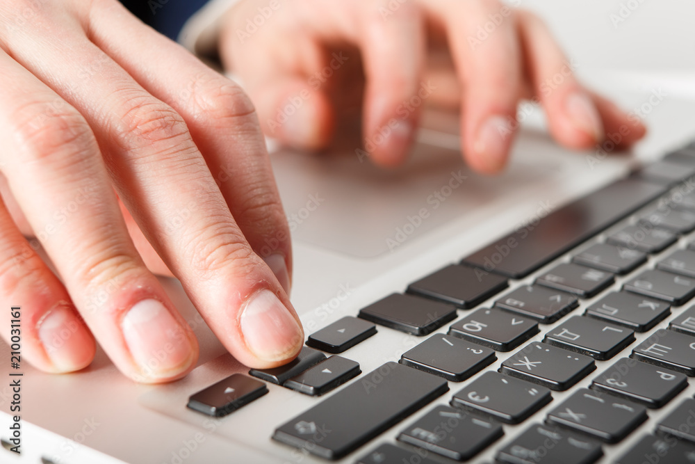 Close-up of hands businessman working at computer in office. Close-up of hands businessman working at computer in office.