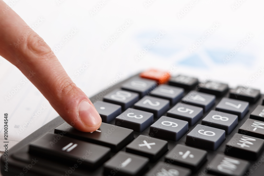 Business people use their fingers to compute calculations Business people use their fingers to compute calculations