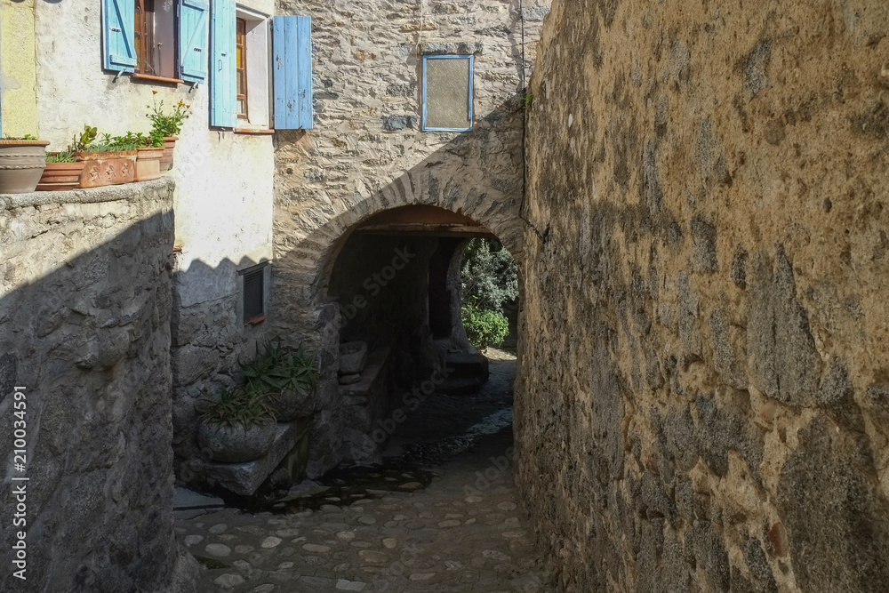 Small street in Eus city, France