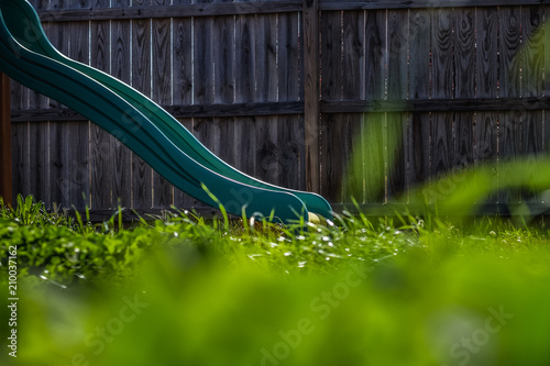 Green Slide on a Backyard Playset