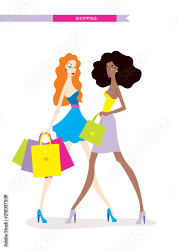 Beautiful young women with shopping bags isolated on white background