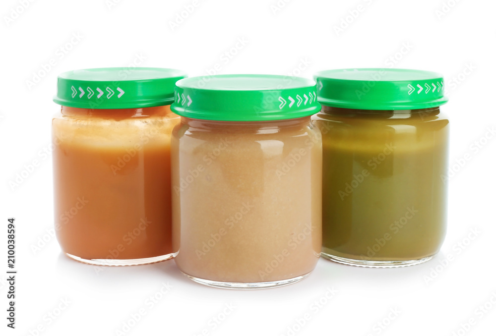Jars with healthy baby food on white background Jars with healthy baby food on white background