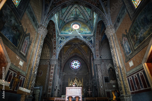 forli / Italy - 4 3 2017: Interiors of catholic medieval sanctuary dedicated to hermit saint Antonio from Padova, a famous italian Franciscan friar. Located in the Emilia Romagna region of Italy photo
